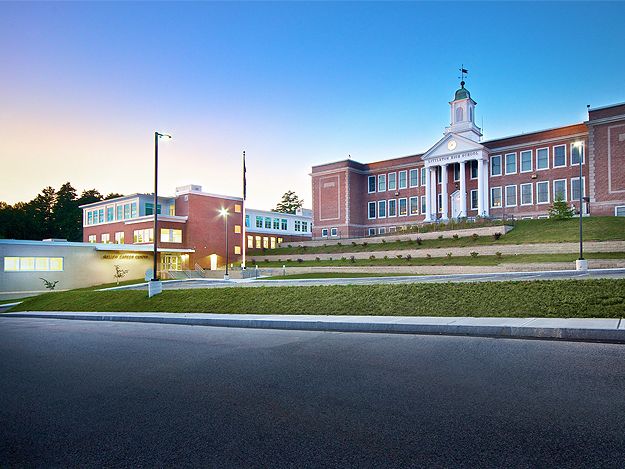 Contemporary brick addition to a tradition brick school