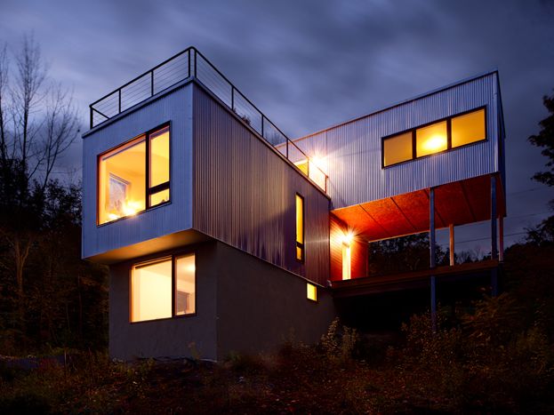 House of cantilevered Steel sided rectangular blocks