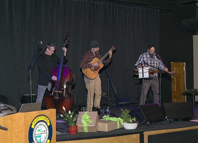 The bluegrass band plays on stage