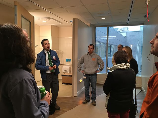 Tour guide shows hospital room