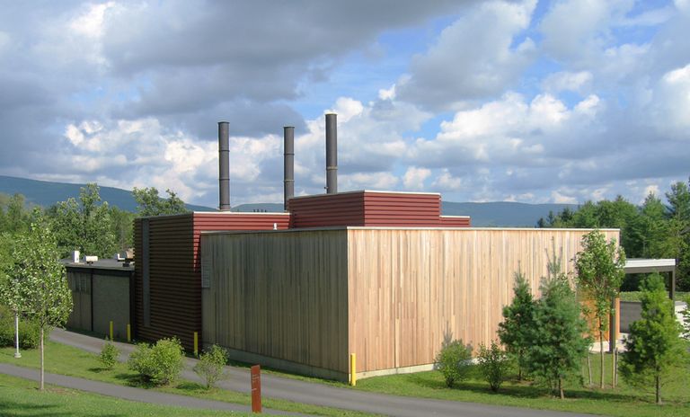wood and horizontal metal cladding on articulated cube volumes