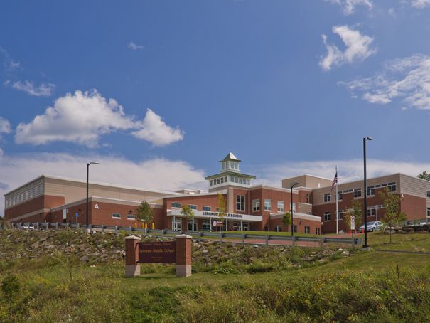 Large brick compound with central tower with cupola