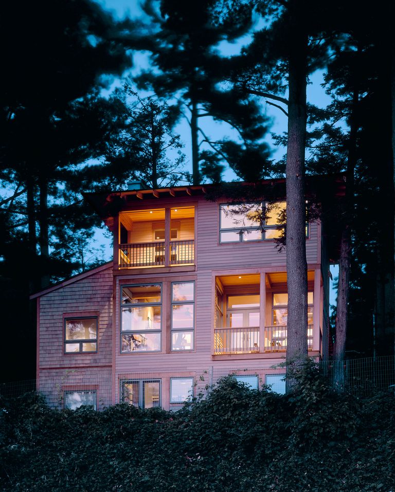 Modern wood and glass residence in the forest