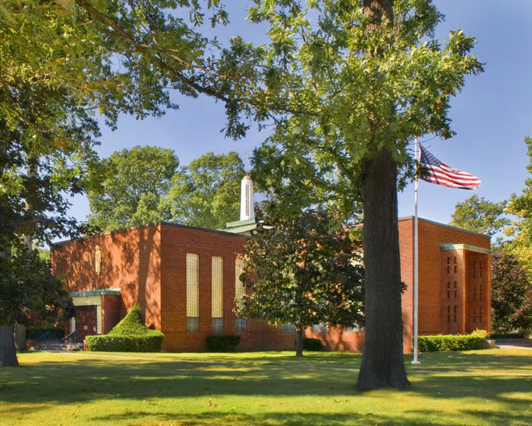 modern brick rectalinear building with glass block