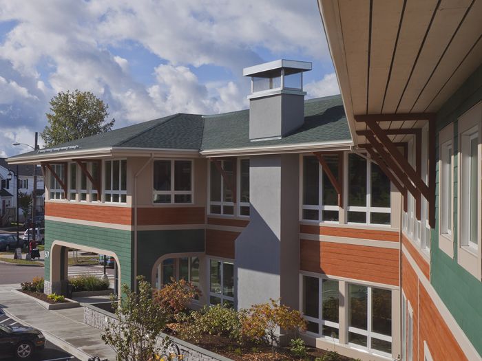 Contemporary clapboard and shingled building